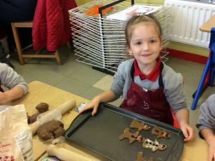 P1 pupils make Gingerbread Men!